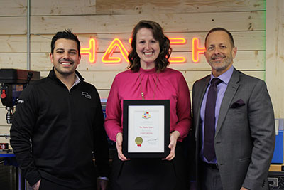 Kathleen Vukovics, Niagara Falls operations manager for Hatch (centre) is joined by Dan Bordenaeve, director of operations, NFRIH (left), and Jim Diodati, mayor of Niagara Falls, at the opening of the NFRIH makerspace.